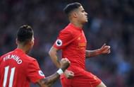 LIVERPOOL, ENGLAND - APRIL 23:  Philippe Coutinho (R) of Liverpool celebrates scoring the opening goal from a free kick during the Premier League match between Liverpool and Crystal Palace at Anfield on April 23, 2017 in Liverpool, England.  (Photo by Laurence Griffiths/Getty Images)